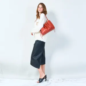 Drawstring bucket bag with leather finish wholesale