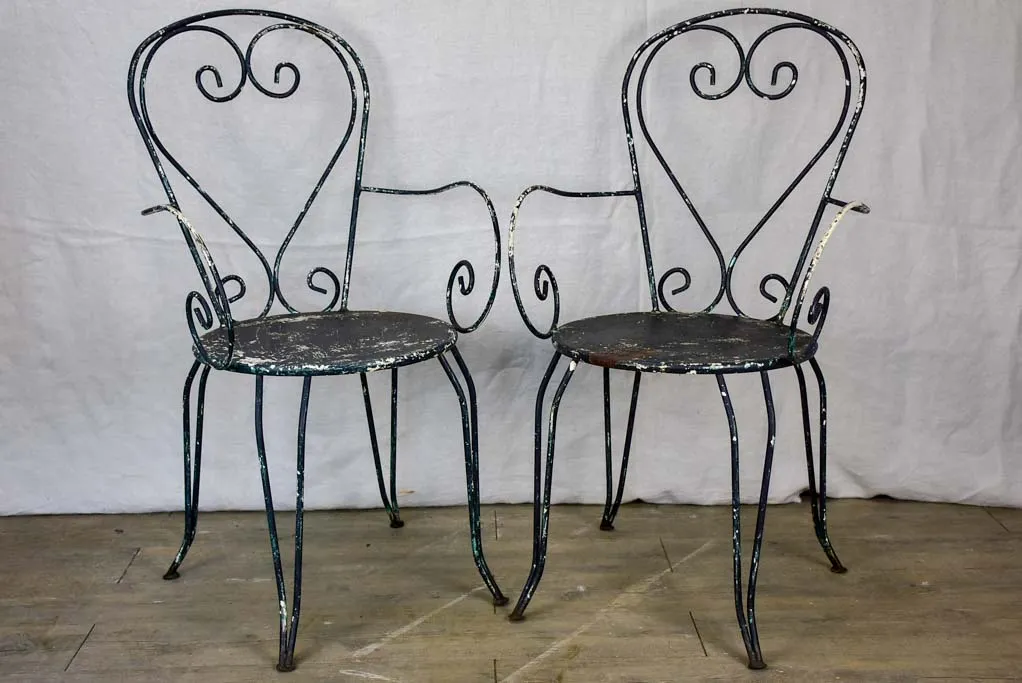Pair of heart-back garden armchairs with black painted finish