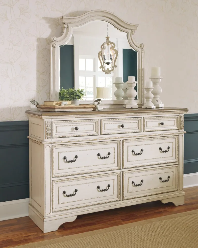 Realyn California King Upholstered Panel Bed with Mirrored Dresser and Chest